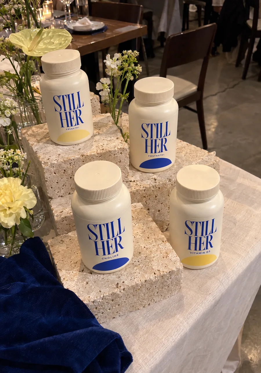 Prenatal, Postnatal, Choline and Vitamin D3 bottles on display